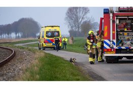 Scootmobiel te water in Midwoud, hondjes gered