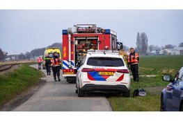 Scootmobiel te water in Midwoud, hondjes gered