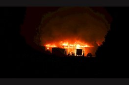 Zeer grote uitslaande brand in loods Lambertschaag