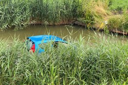 Auto te water na botsing